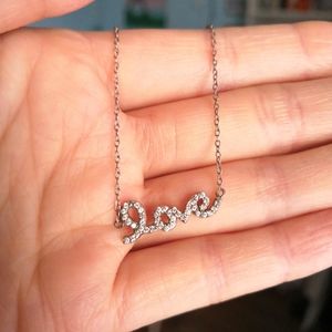Sterling silver LOVE script necklace